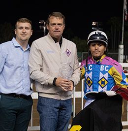 Michael and Heath Taylor, with Jose Nicasio, accept the Robt Boniface Los Alamitos Championship stakes trophy.