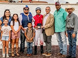 LQHBA Executive Director Bruce Salard presents the winning connections of Rouge Fast Dash with the Flashy Hemp Stakes trophy at Delta Downs.