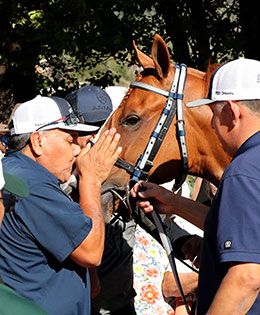 Political Twist gets a well-deserved kiss from co-owner Javier Rodriguez.