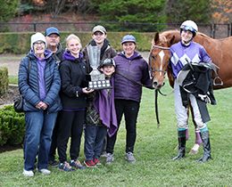 The winning connections of Chillin With Peeps’ accept the Alex Picov Memorial Futurity trophy at Ajax Downs on Wednesday.