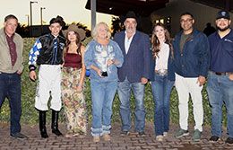 The winning connections of Aj Flawless accept the Lobo Derby stakes trophy at Albuquerque Downs Saturday night.