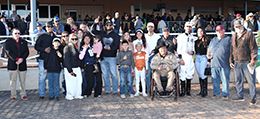 The winning connections of Woody Rocks accept the NM Classic Derby-G2 trophy at Zia Park on Sunday.