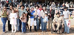 The winning connections of Triple 7 accept the NM Classic QH Juvenile trophy at Zia Park on Sunday.