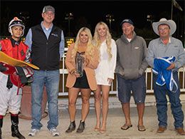 Matt, Bendi, and Madison Dunn with Armando Cervantes and Monty Arrossa after their win in the PCQHRA Breeders' Futurity Sunday night.