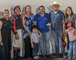 The winning connections of C The Power accept the Delta Dash Stakes trophy on Saturday at Delta Downs.