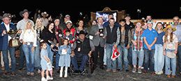 The winning connections of Holy Guacamolee accept the Texas Classic Futurity stakes trophy at Lone Star Park Saturday night.