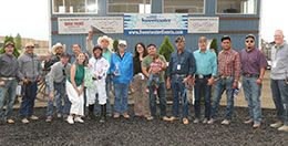 The winning connections of Ojd Jess A Bug accept the Sweetwater Downs Derby stakes trophy on Sunday afternoon.