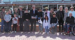The winning connections of Jess A Outlaw accept the Lonnie and Elam Memorial Stakes trophy at Sunland Park Sunday.