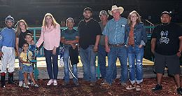 The winning connections of Little Sure Shot accept the Fair Meadows Juvenile Stakes trophy on Saturday at Fair Meadows in Tulsa.
