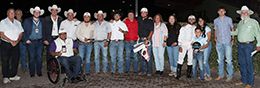 The winning connections of Peppa accept the 40,000 Albuquerque Juvenile Stakes trophy at The Downs At Albuquerque on Saturday.
