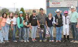 The winning connections of Cowboy Cadilac accept the Sweetwater Downs Futurity stakes trophy on Saturday afternoon.