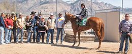 The winning connections of Jr Calendar Girl accept the trophy after winning the $95,866 Beehive Futurity Trials on Saturday at Weber Downs.