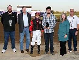 The winning connections of Seize Greatness accept the $83,100 Hoosier Park Classic trophy at Horseshoe Indianapolis on Wednesday.