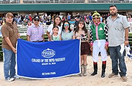 The winning connections of V Golden Game accept the Colors of the Alamo P&A Maturity trophy at Retama Park on Saturday.