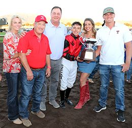 The winning connections of Jess Good Wine accept the $250,000 All American Gold Cup [G1] trophy at the Downs at Albuquerque on Monday.