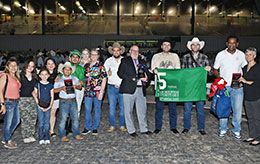 The winning connections of Britts Special Candy accept San Houston Futurity stakes trophy on Saturday at Sam Houston Race Park.