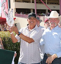 The winning connections of Bacardi accept the All American Invitational Stakes trophy at The Downs at Albuquerque.