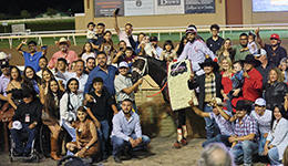 The winning connections of Fall Classic accept the Heritage Place Futurity stakes trophy on Saturday at Remington Park.
