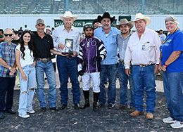The winning connections of Master Reigns accept the Jesse Yoakum Memorial 870 Stakes trophy on Saturday at Sam Houston Race Park.