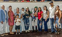 The connections of Tha Duke accept the $50,000 Mid City Stakes winning trophy at Delta Downs on Saturday.