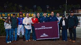 The winning connections of Doodah Cartel accept the $202,500 Los Alamitos Winter Derby (G1) trophy at Los Alamitos on Saturday.