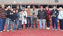 The winning connections of Woody Rocks accepting the NMHBA Quarter Horse Stakes trophy at Sunland Park Saturday.