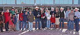 The winning connections of Boot Scootin Mama accept the Shue Fly Stakes trophy at Sunland Park Sunday.