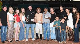 The winning connections of Baby Ruth accept the Speedhorse Quarter Horse Derby stakes trophy at Fair Meadows Saturday.