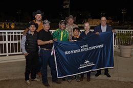 The winning connections of Favorite Jesshawk accept the $150,000 Brad McKinzie Los Alamitos Winter Championship (G1) trophy at Los Alamitos on Sunday.