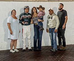 The winning connections of San Loranzo Luna accept the $33,600 Mother’s Day Stakes trophy at Delta Downs on Saturday.