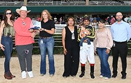 The winning connections of Fabulous Casina accept the $58,500 TQHA Sale Sophomore Stakes winning trophy on Friday at Retama Park.