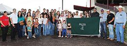 The winning connections of Ah Mr Lana Del Rey accept the $50,000 Bill Reed Memorial Stakes trophy at the Downs at Albuquerque on Saturday.