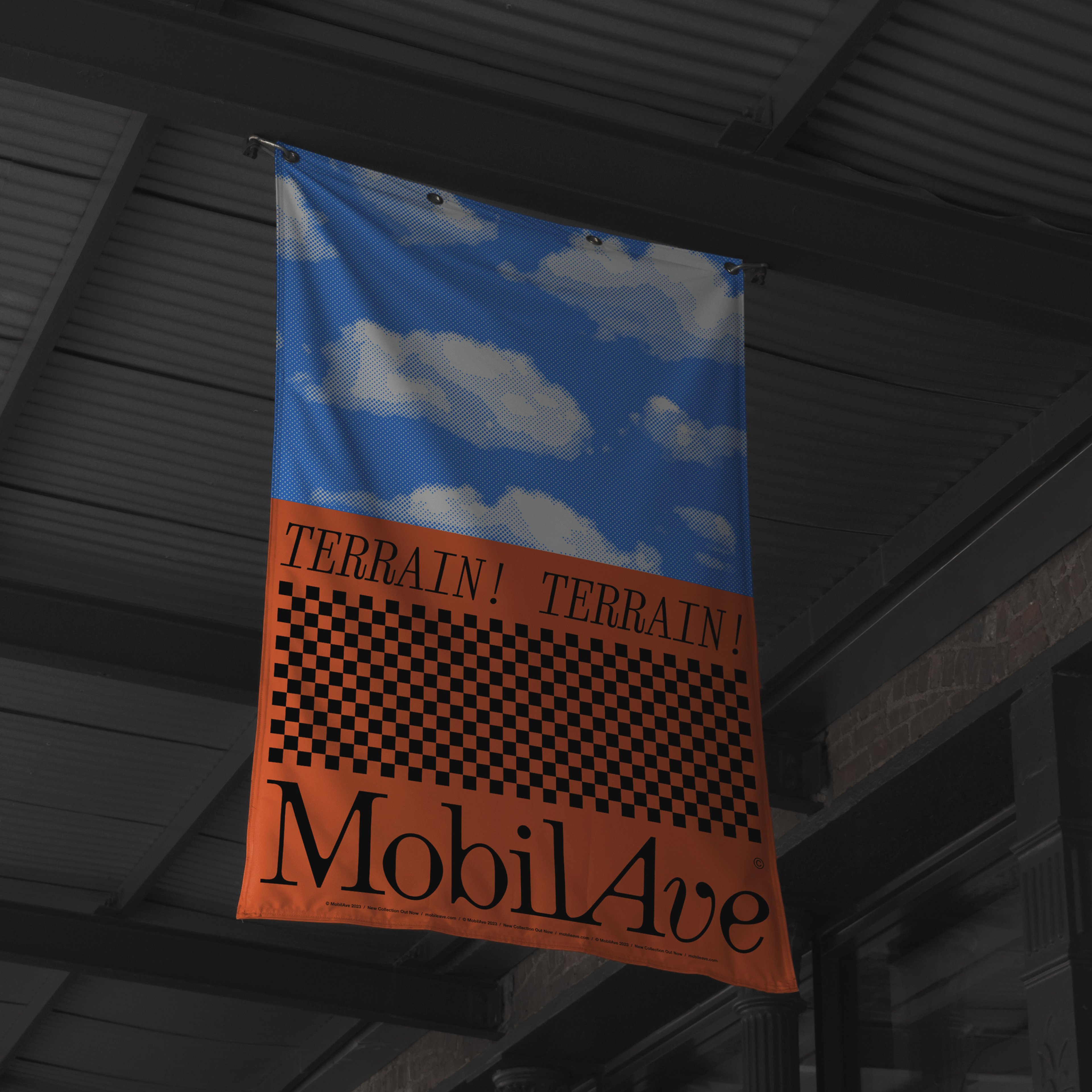 A Mobil Ave branded printed flag hanging from the ceiling of a building