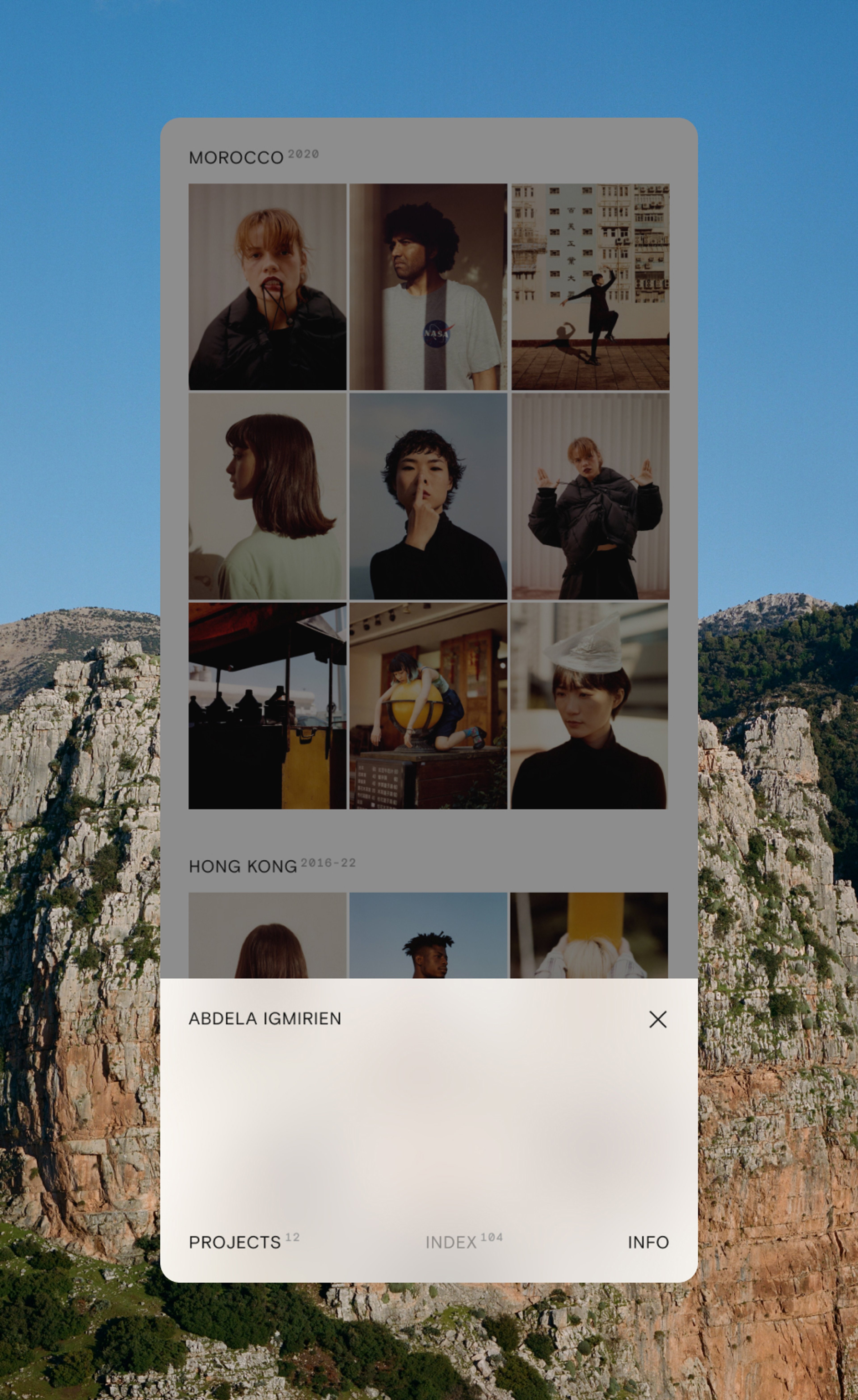 Screenshot of Abdela Igmirien's website showing the mobile navigation