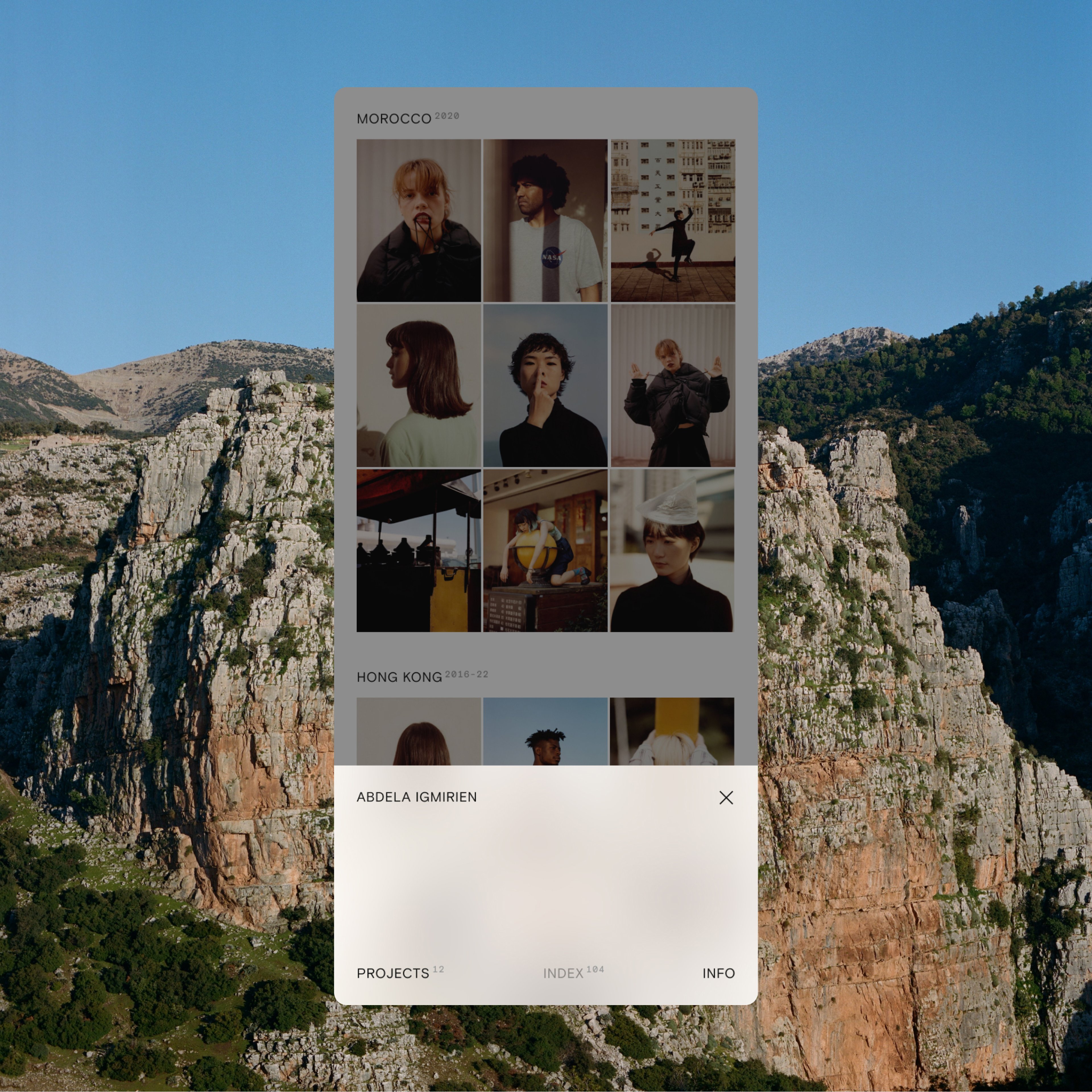 Screenshot of Abdela Igmirien's website showing the mobile navigation
