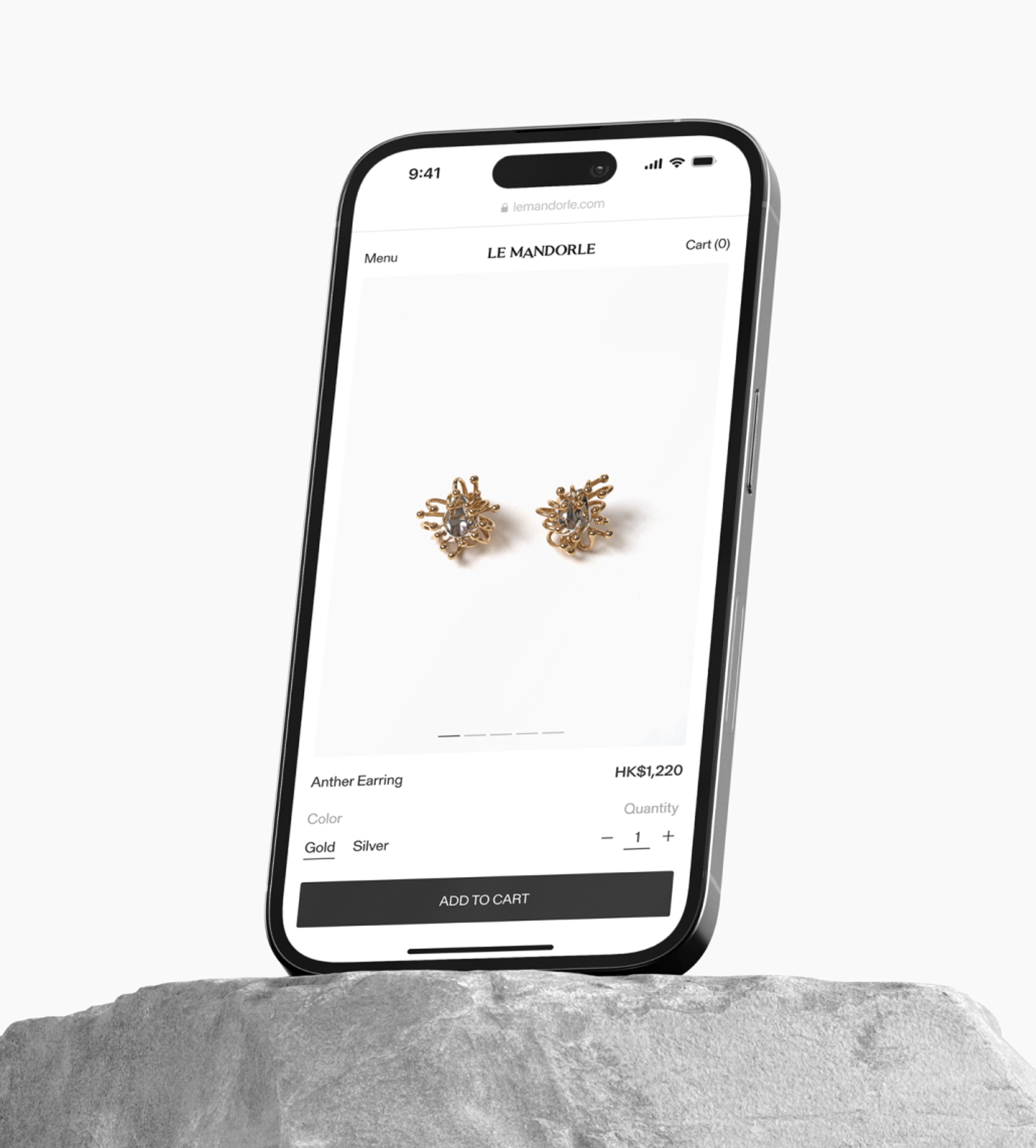 Image of a iPhone balancing on a stone showing the product description page