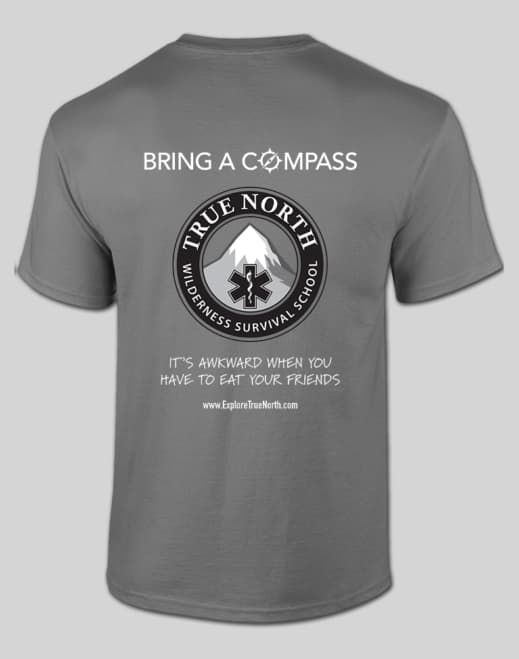 Gray t-shirt with True North logo and says "Bring the Compas"