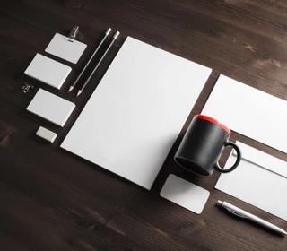 Corporate stationary on wooden table