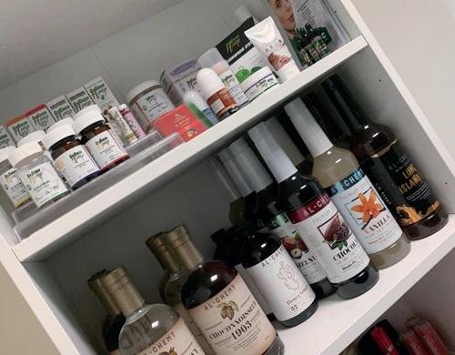 Shelves with various pills and bottles