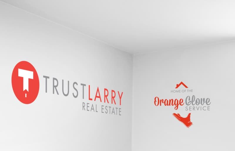 Trust Larry Real Estate wall