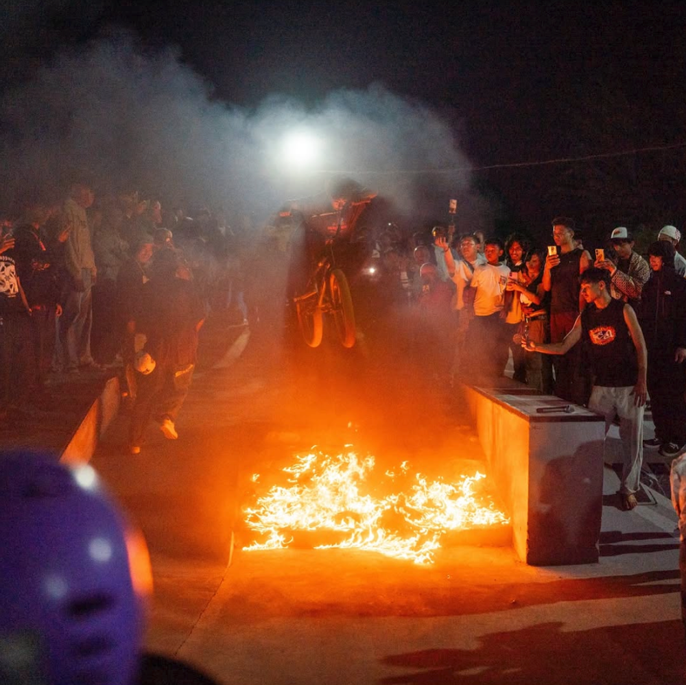 Bmxer at skate jatra doing tricks on fire