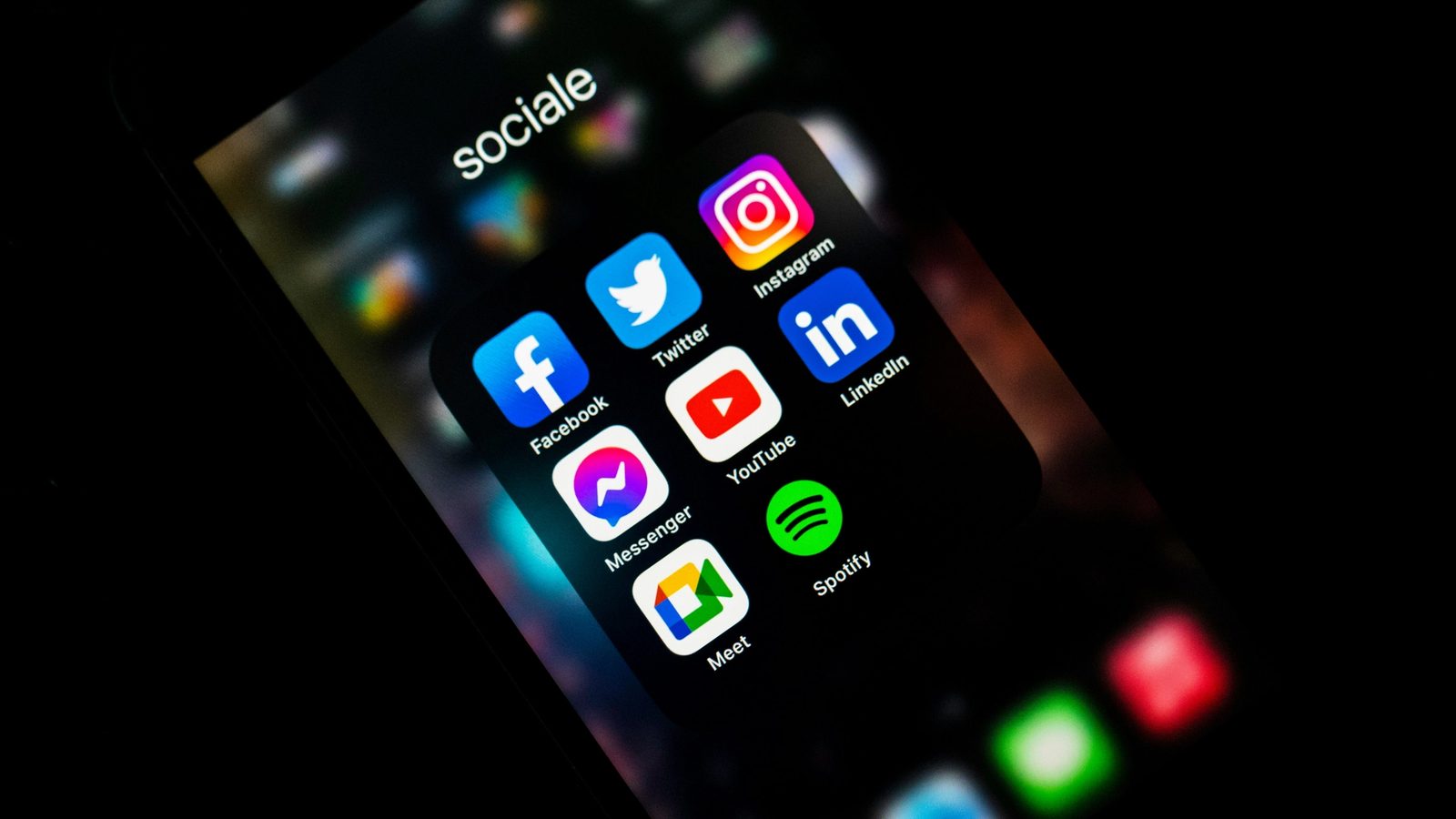 Main Image: iPhone screen with several social media icons