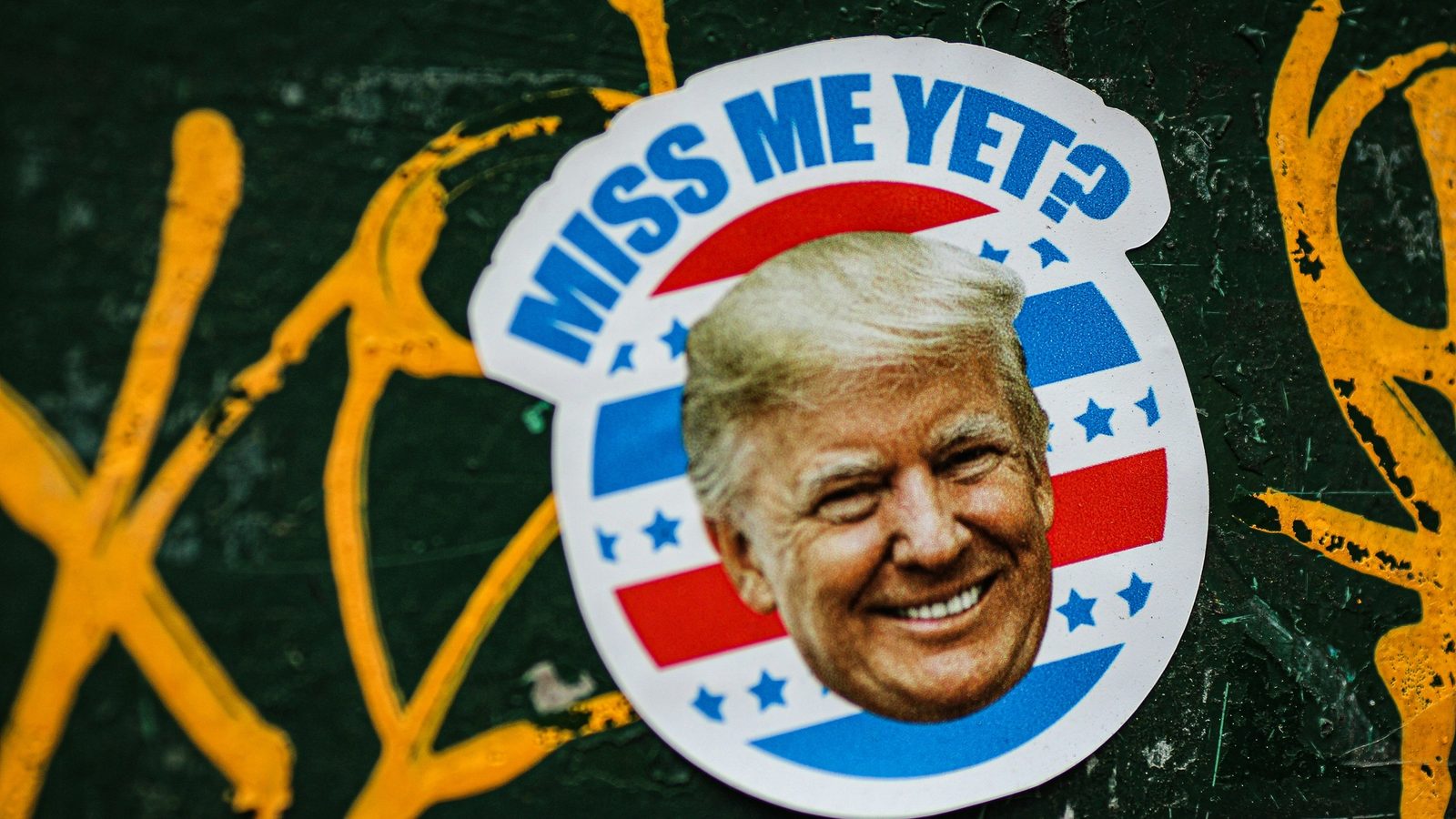 Main Image: Donald Trump label pin written "Miss Me Yet?"