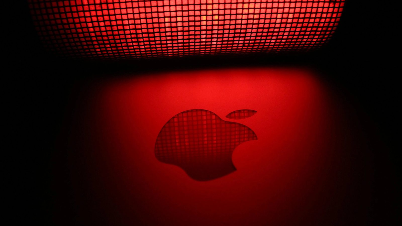 Apple logo in a red backdrop