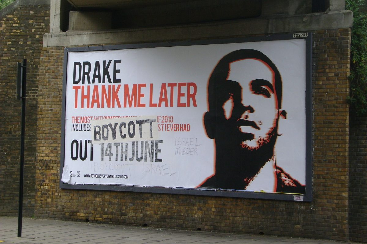 Poster of Drake's Thank Me Later album cover with 'Boycott' sprayed on it.