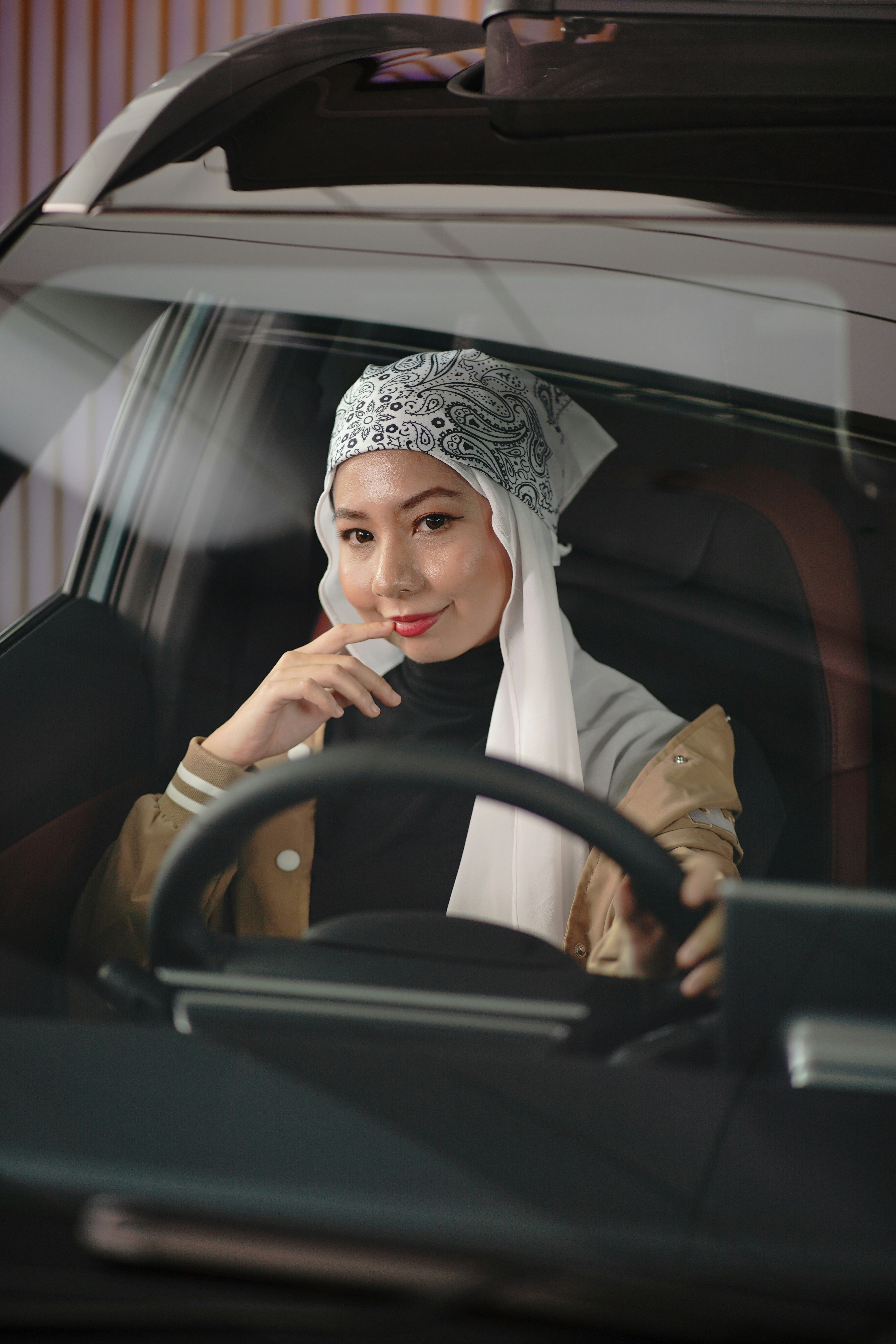 A Malaysian woman behind the wheel