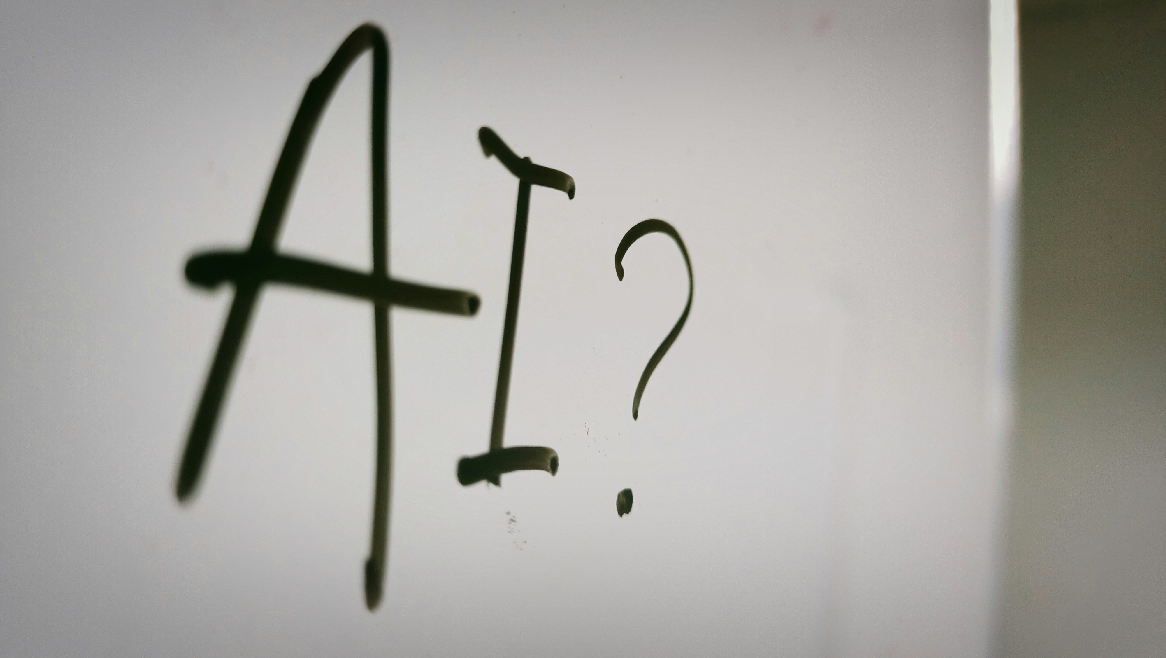 "AI?" Written on a whiteboard