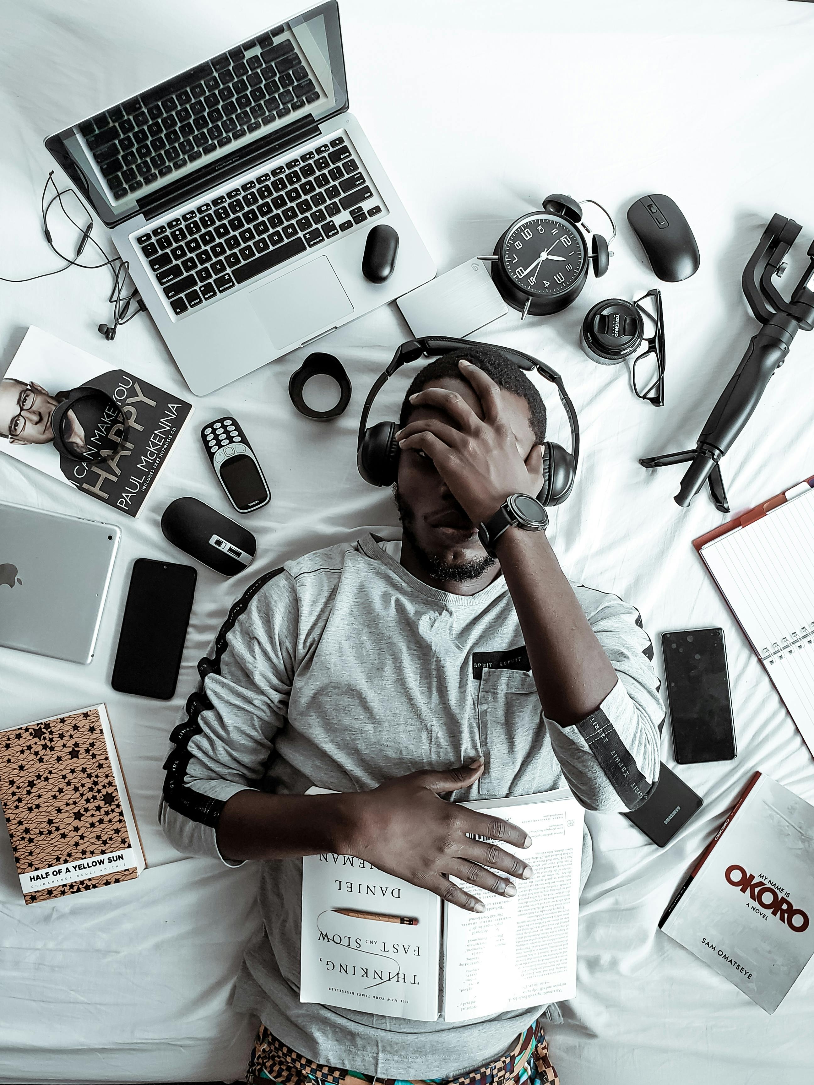 Main Image: Man Surrounded by Gadgets