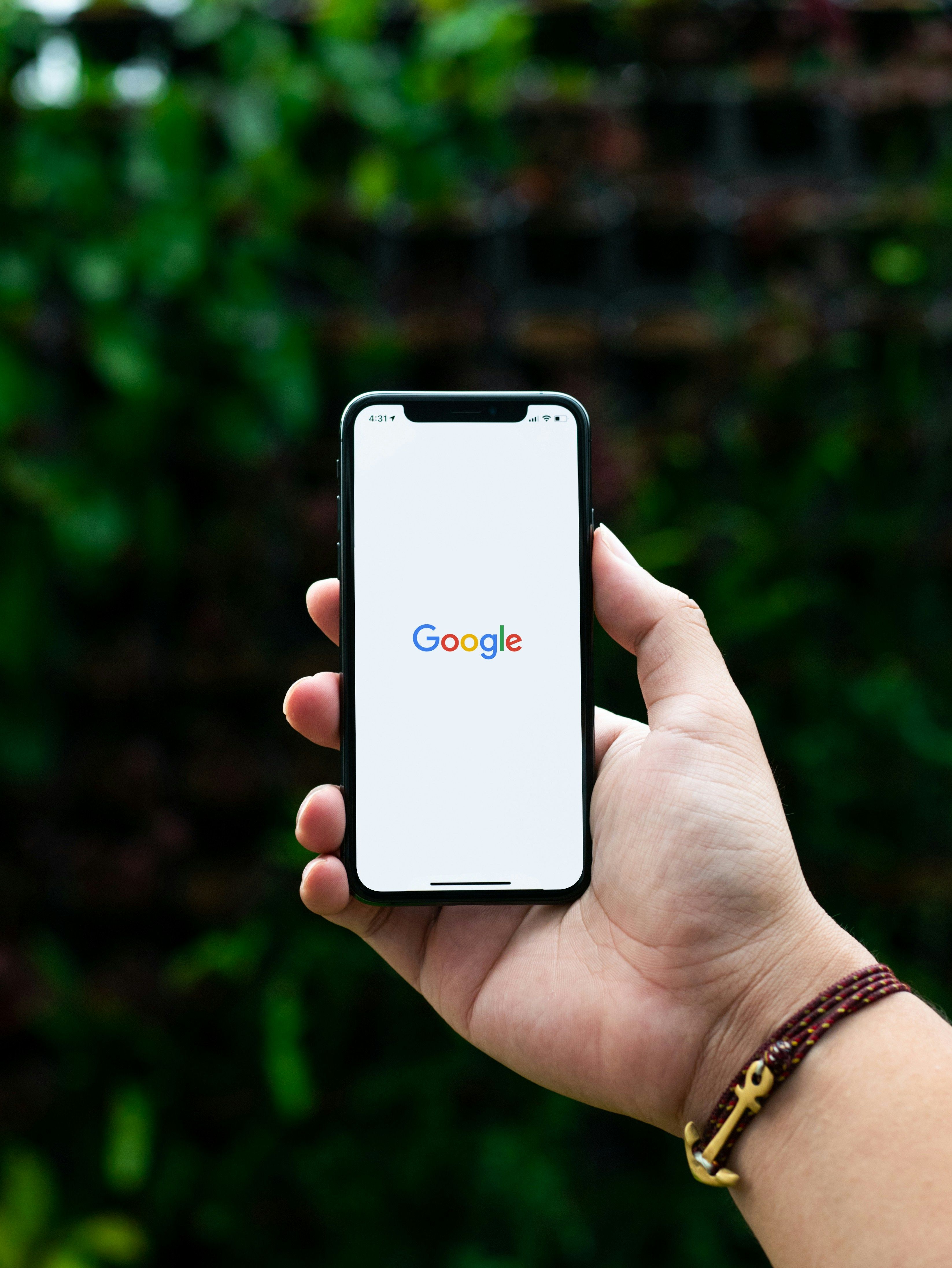 Black phone with google search app in use