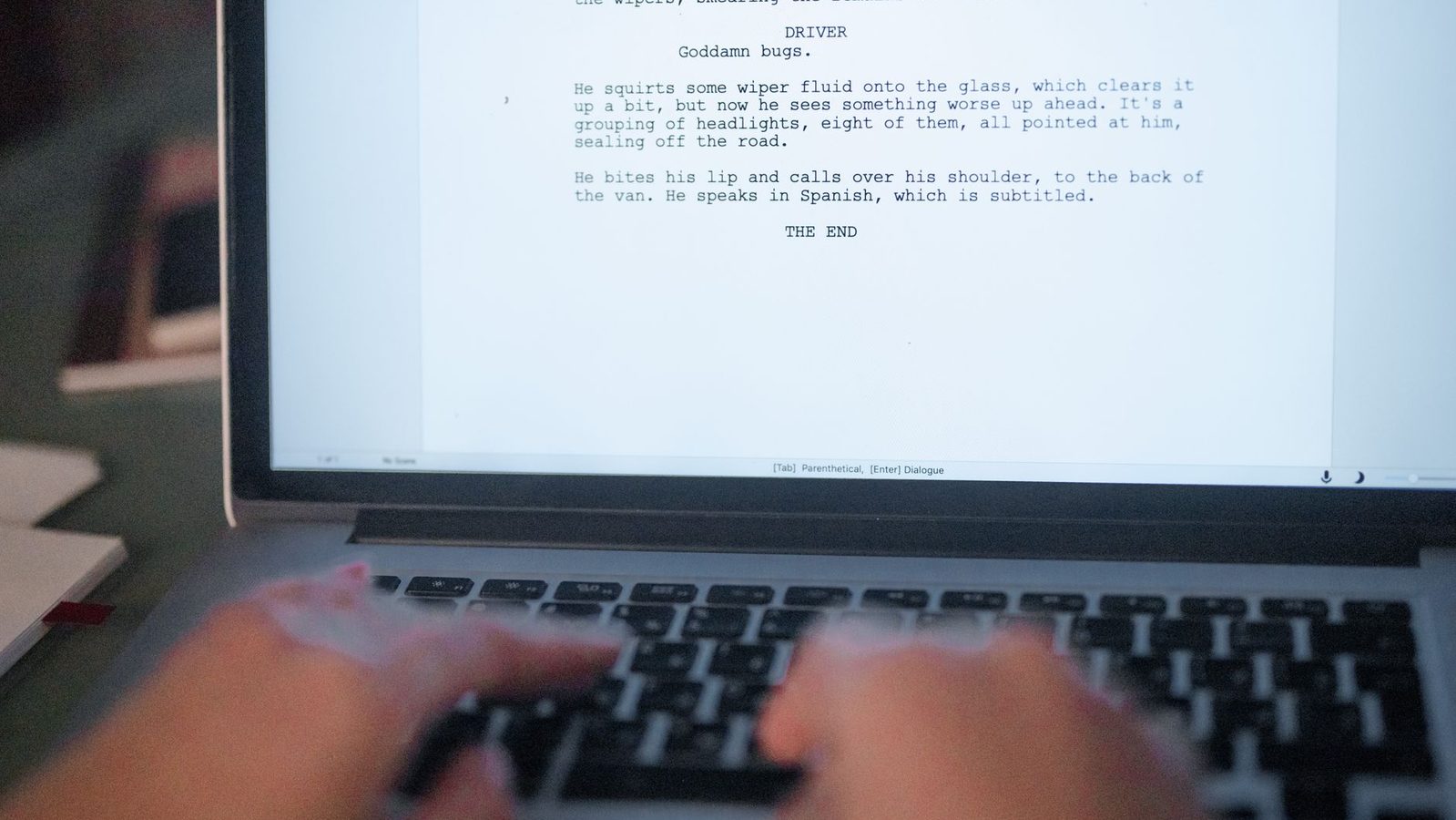 Editing written text on a laptop